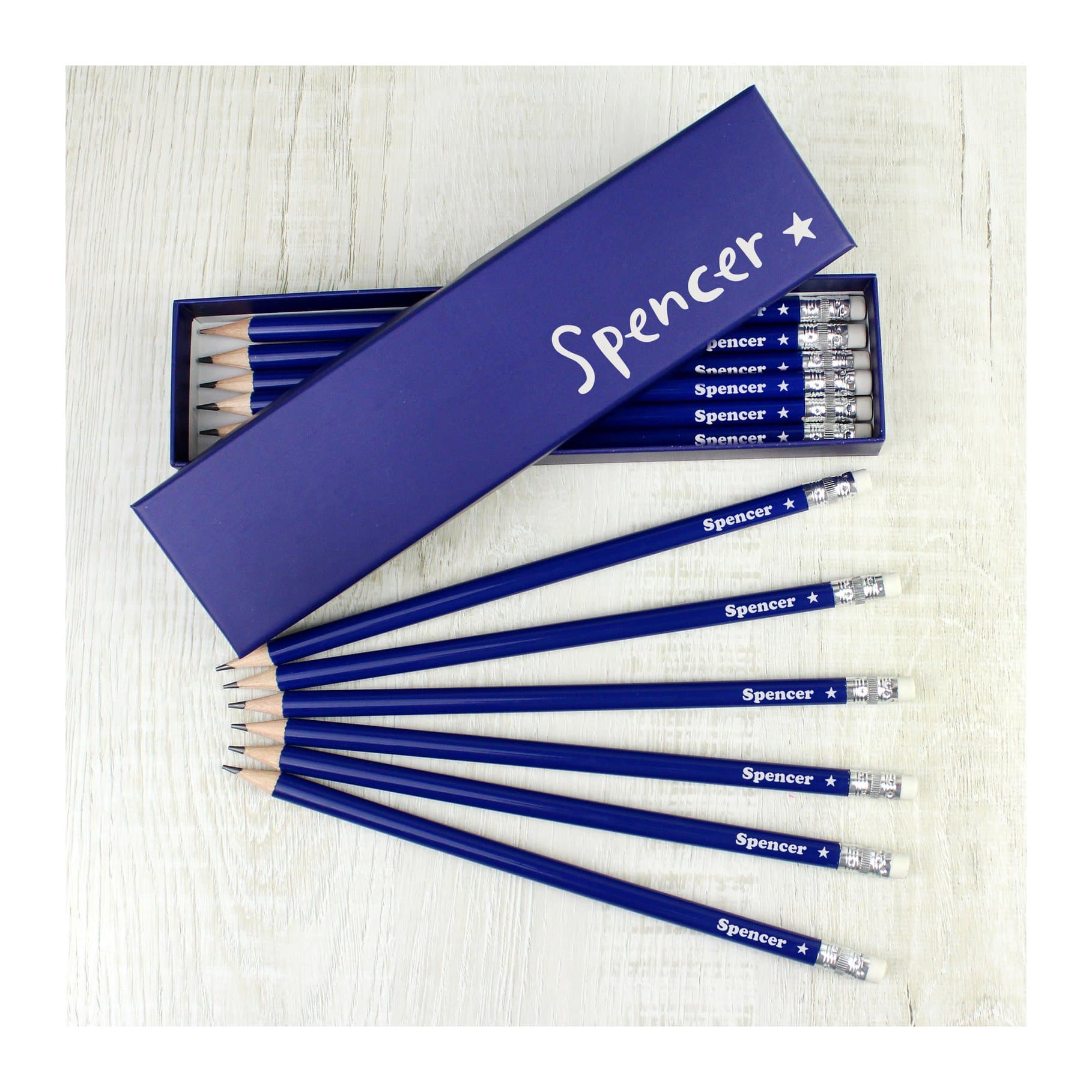 Star Box holding twelve blue HB pencils
