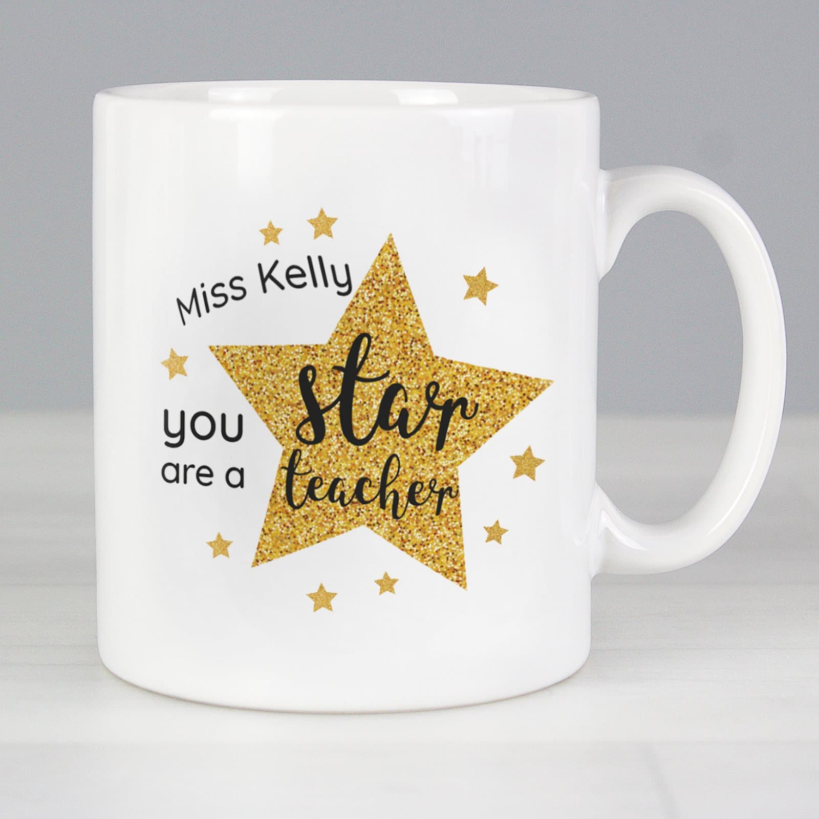Personalised star teacher's ceramic mug with a name on the front