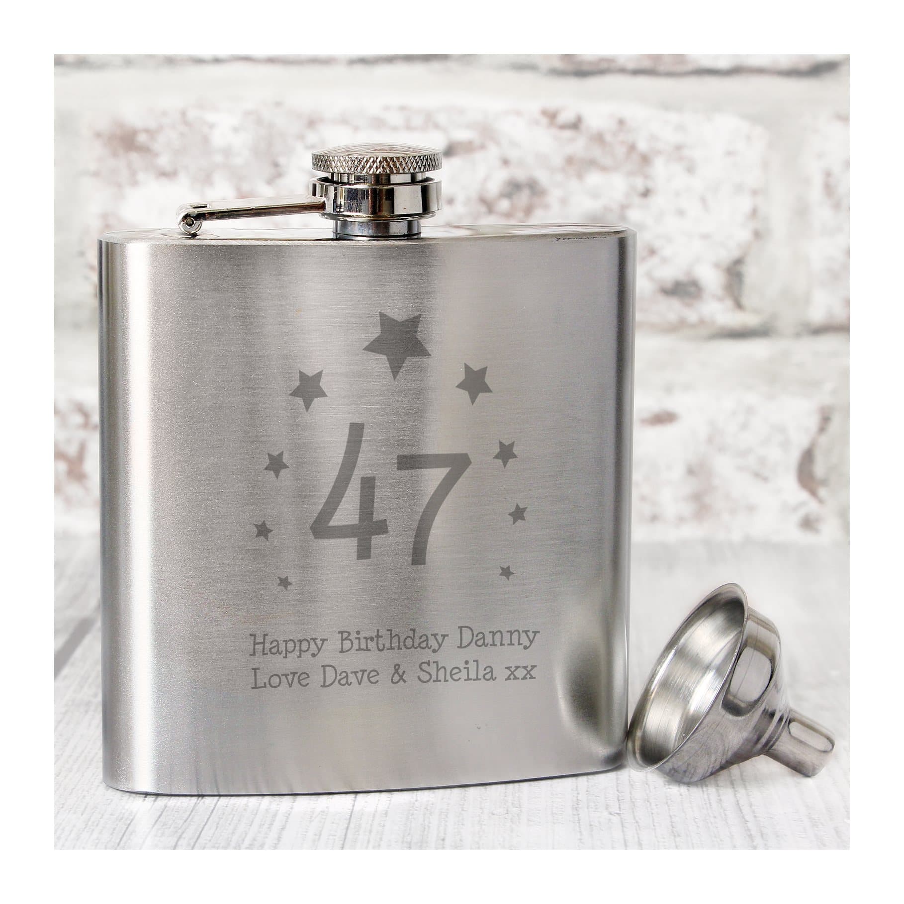 Hip flask engraved with a star motif, an age and a message