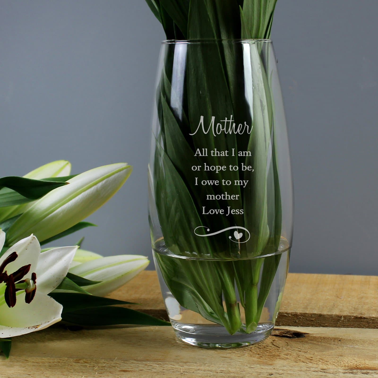 Hand blown glass bullet vase with a swirls and hearts design and personalised text
