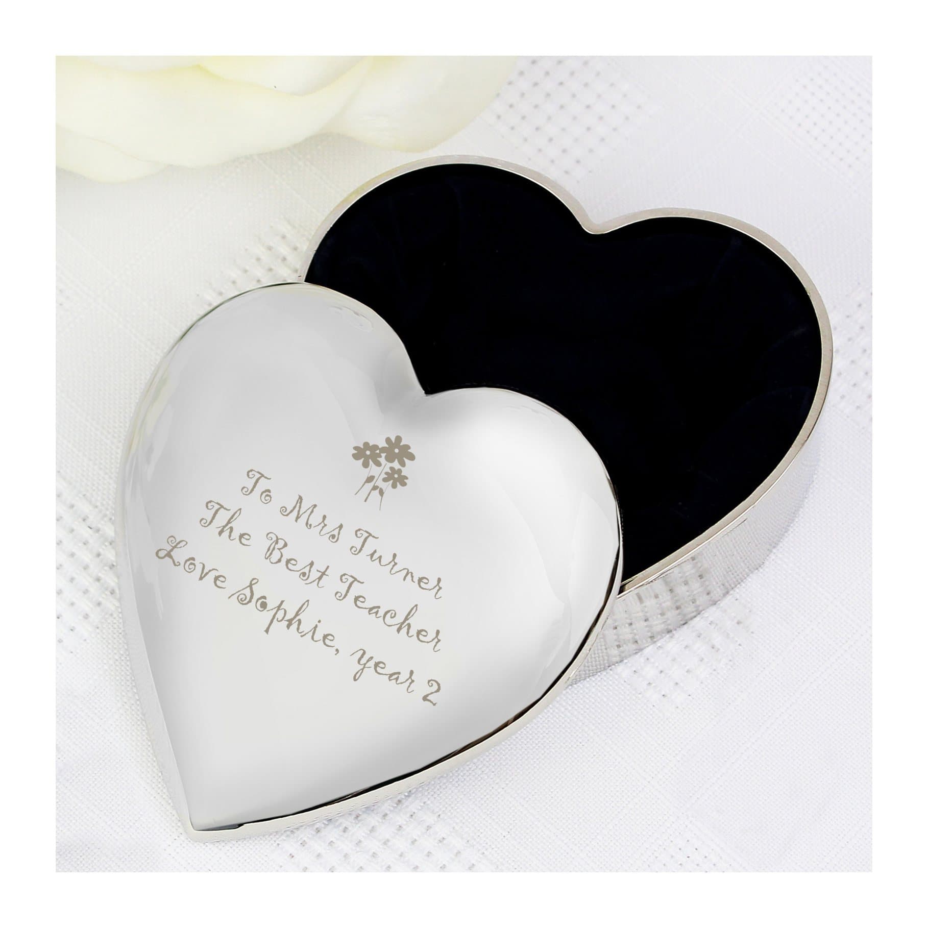 Heart shaped trinket box with a flower motif and engraved message