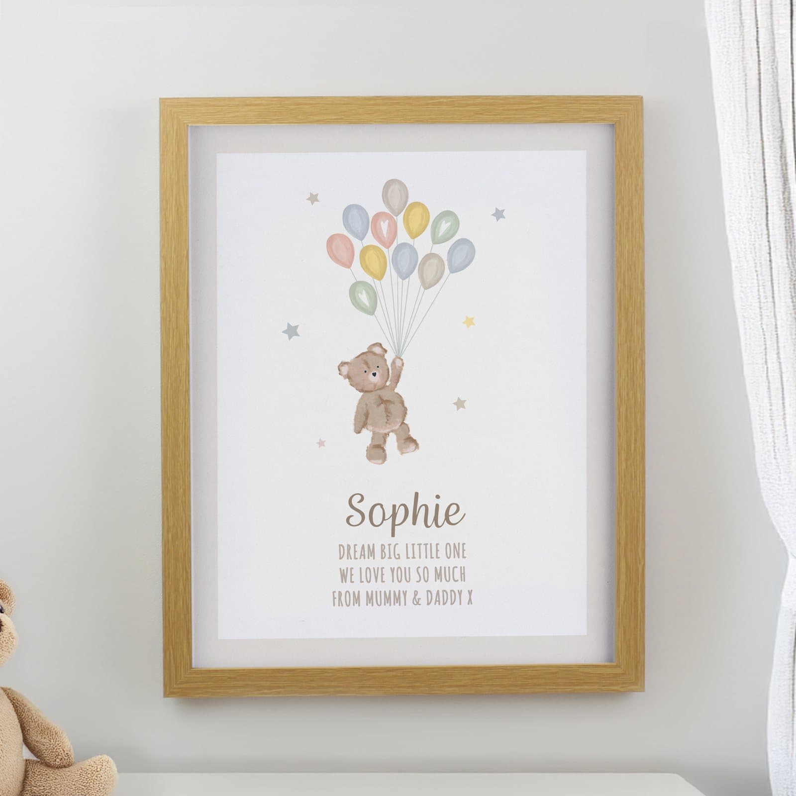 Oak frame with a teddy and balloon print and personalised lines of text
