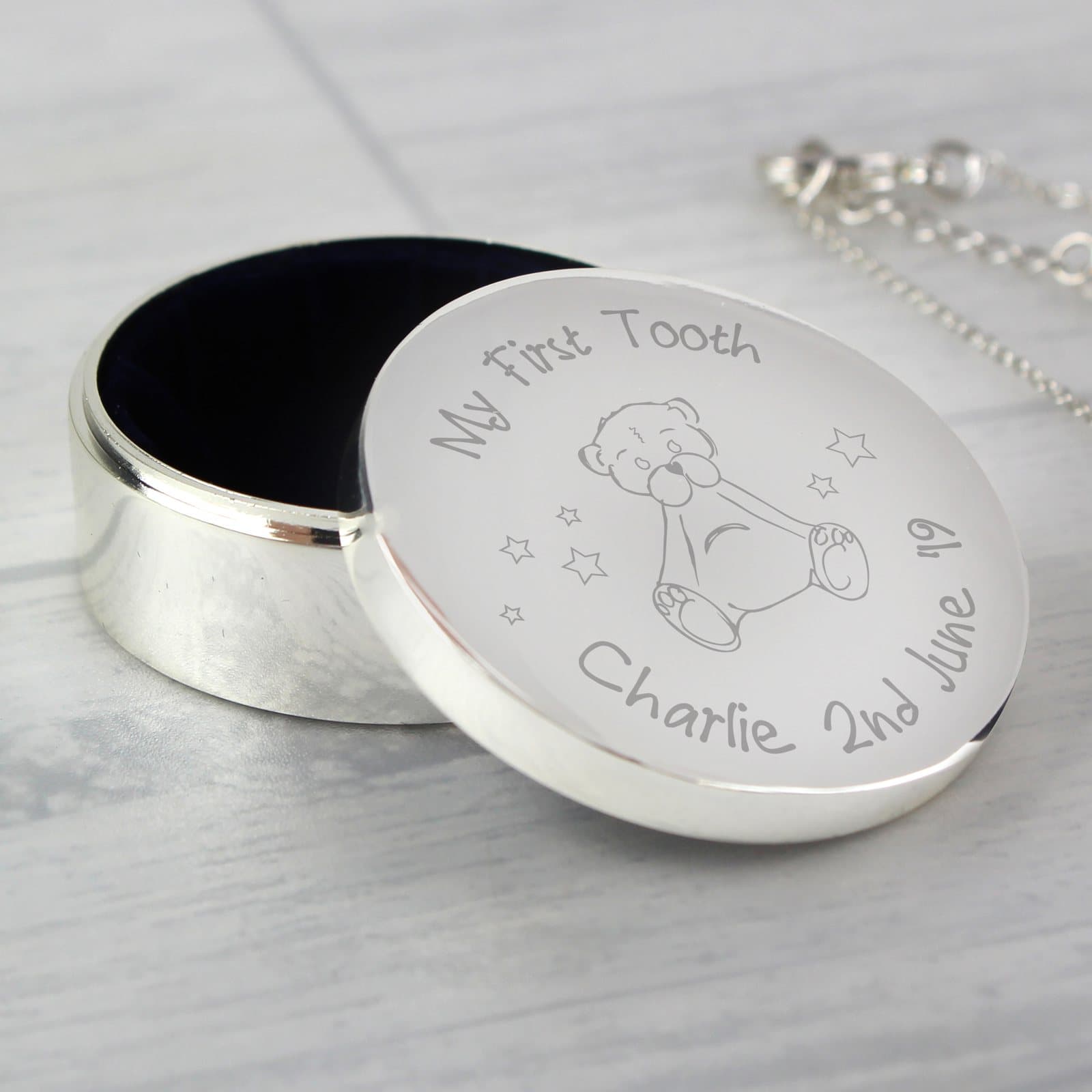 Small silver plated teddy trinket box with My First Tooth wording on the lid