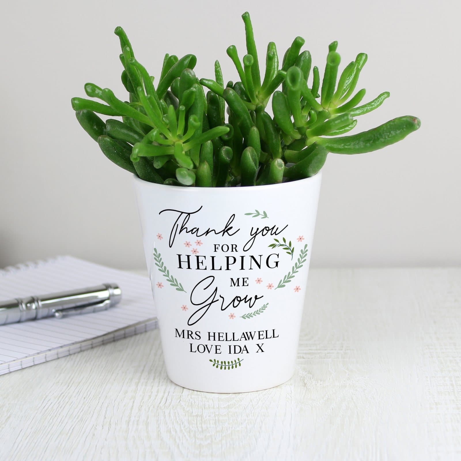 Ceramic plant pot reading Thank You for Helping Me Grow