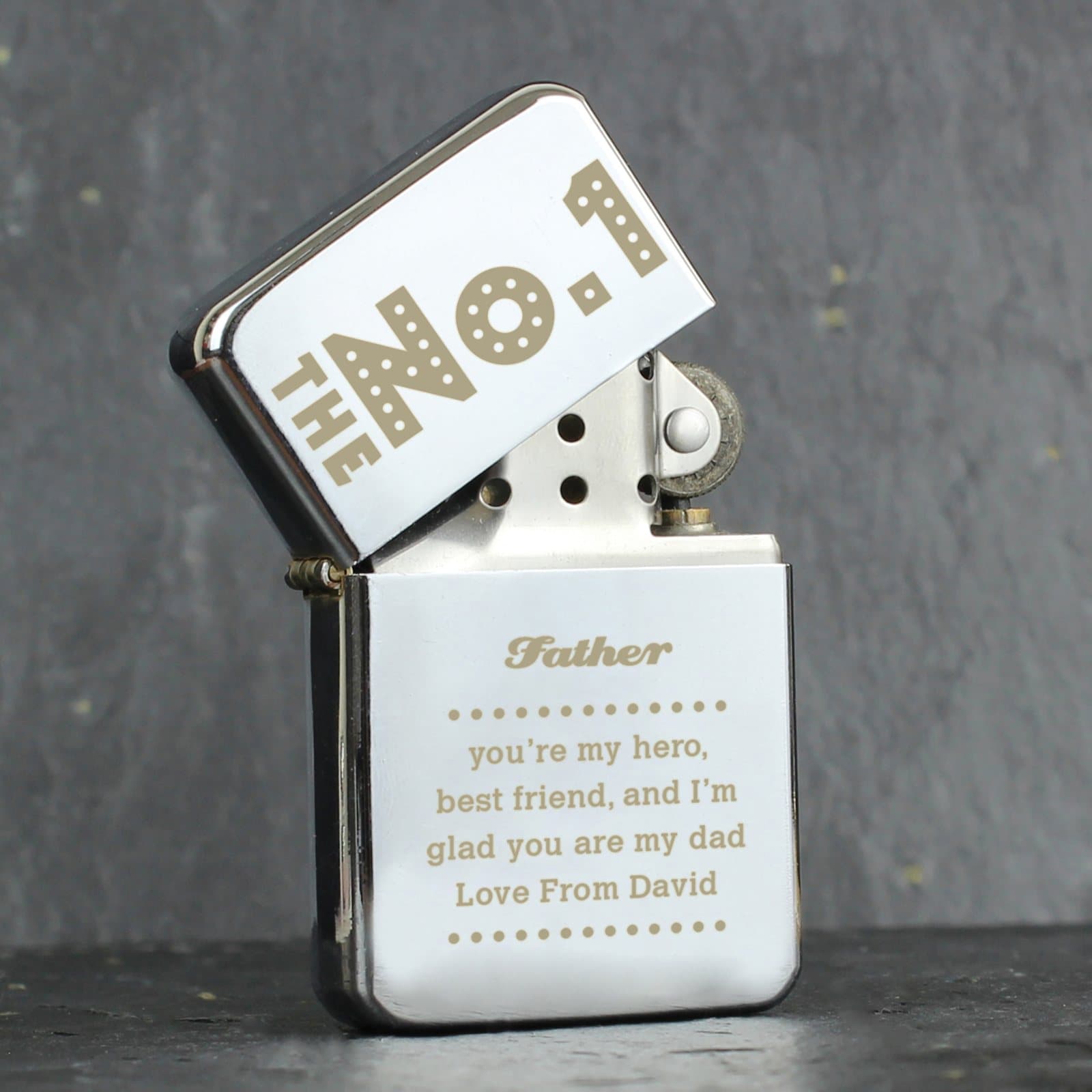 Silver oil lighter with The No.1 text and personalised role and message
