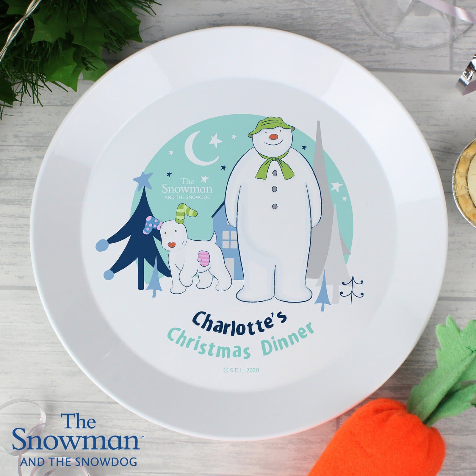 Plastic dinner plate with The Snowman and the Snowdog design and a personalised name