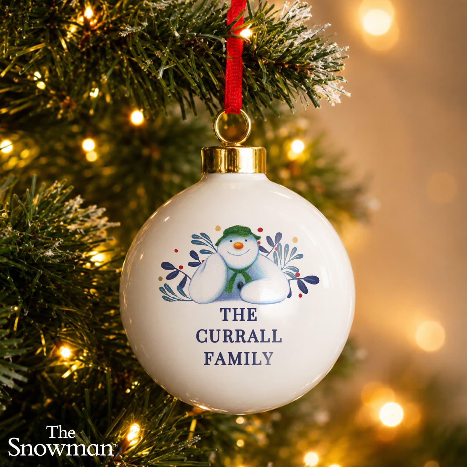 The Snowman botanical Christmas bauble with a ribbon
