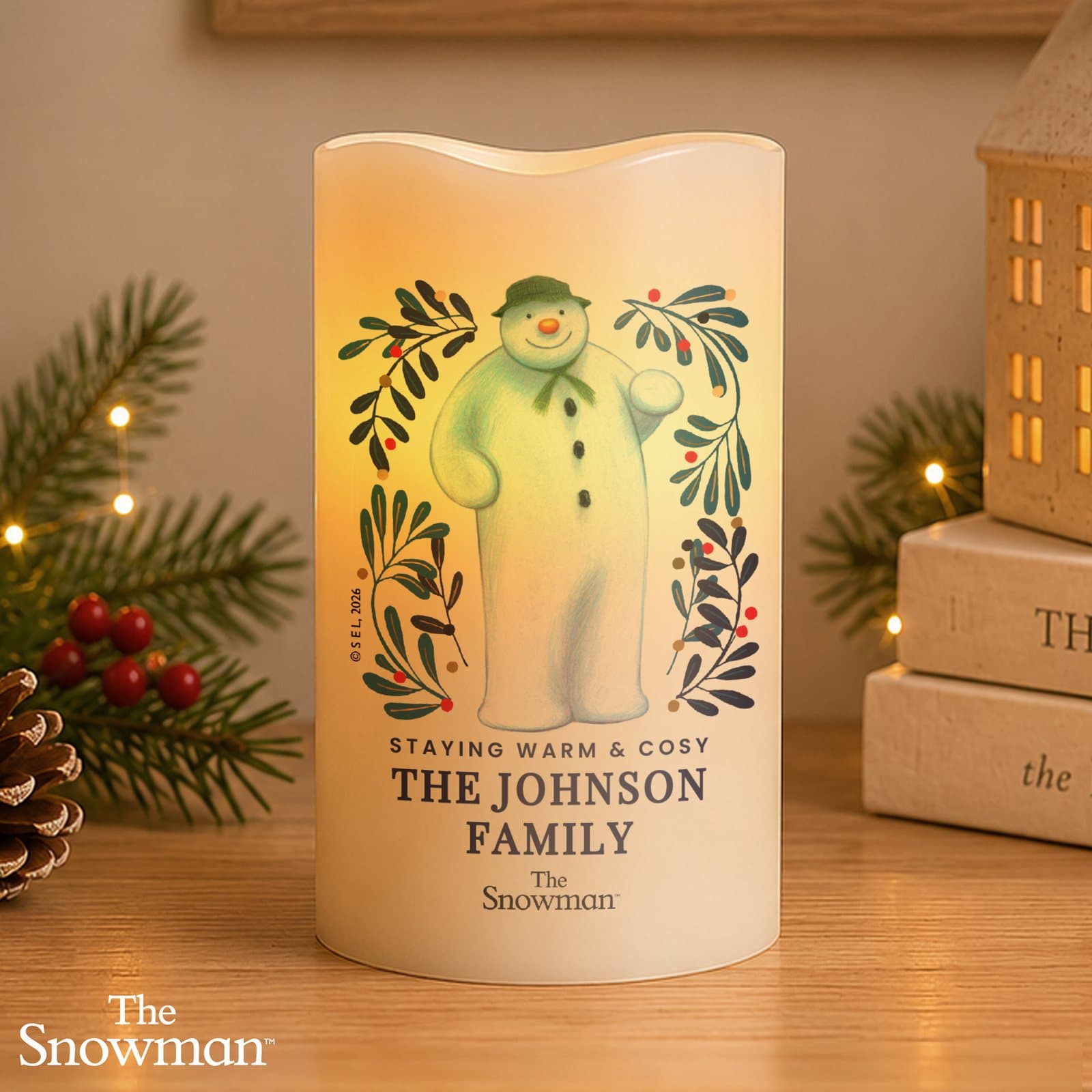 Personalised The Snowman botanical LED candle with three lines of text