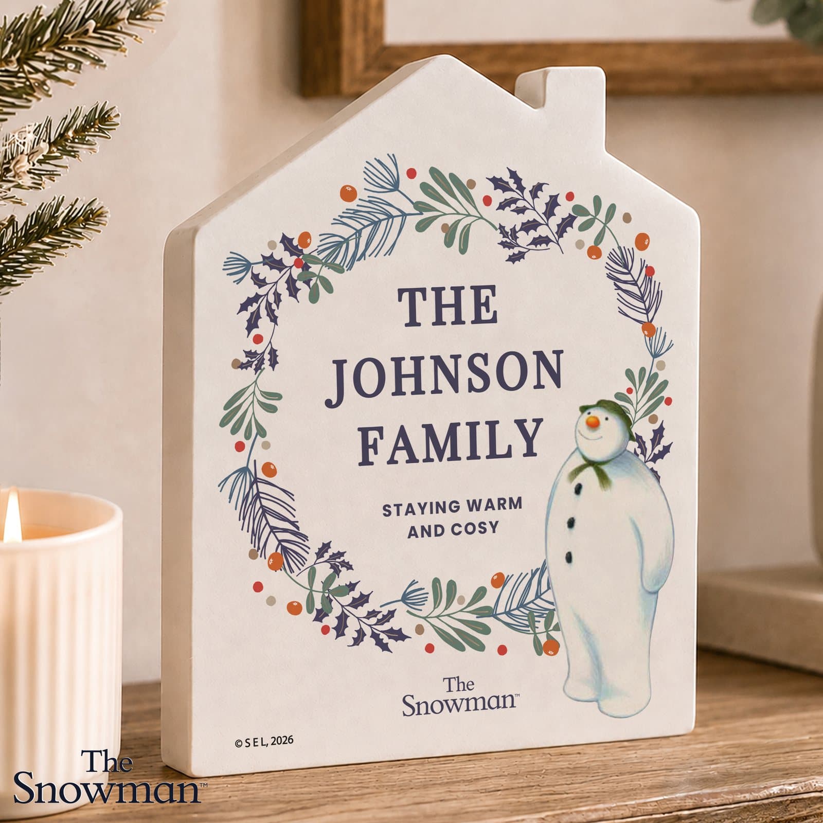 Wooden Snowman house decoration with five lines of personalised text