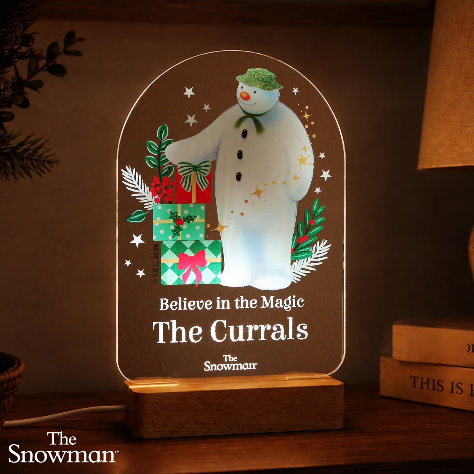 Snowman LED sign night light on a base with two lines of personalised text
