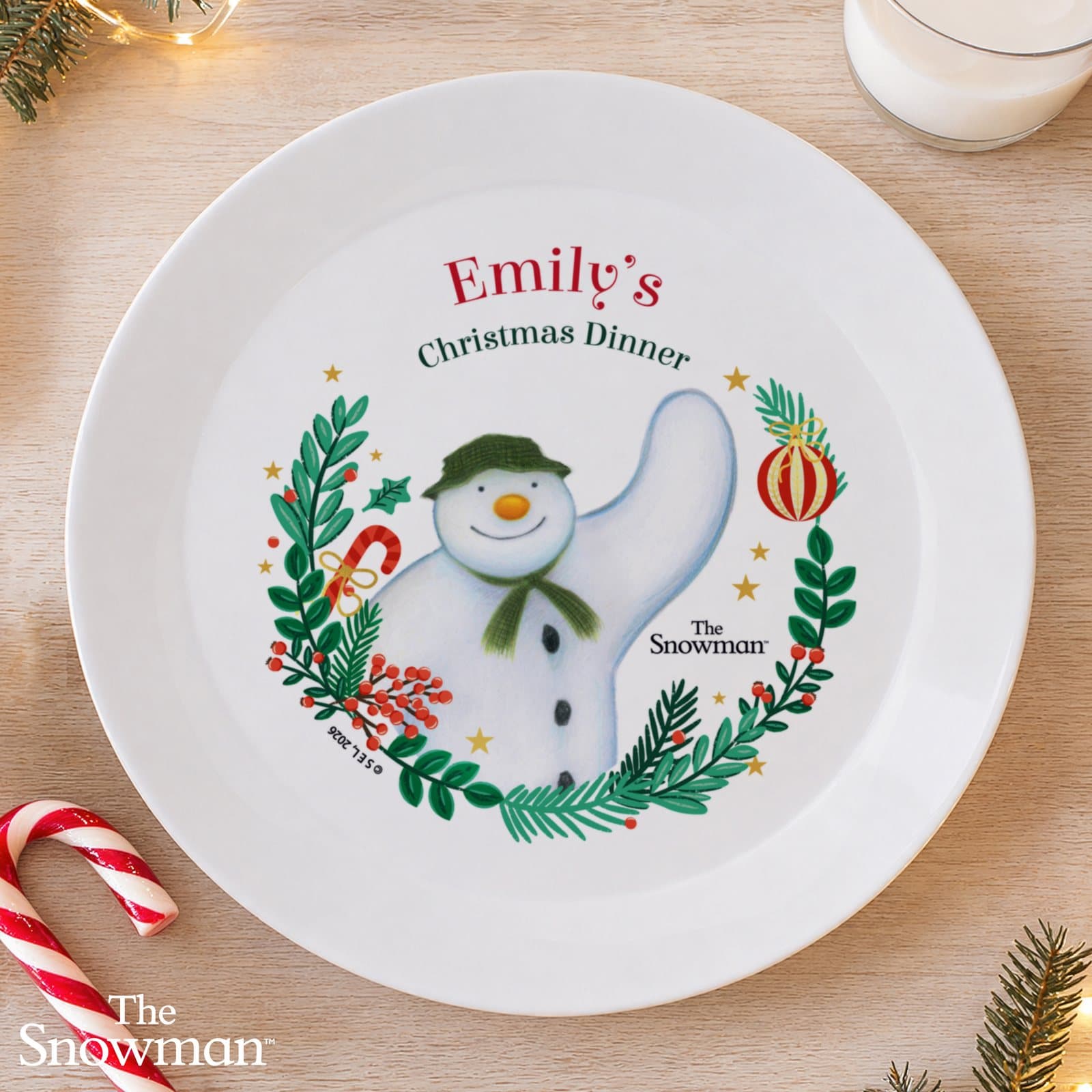 The Snowman Christmas Wishes plastic plate with a personalised name and message