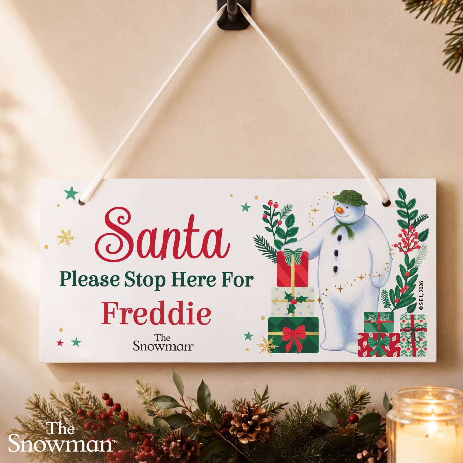 Wooden Santa Please Stop Here For sign with a personalised name and ribbon