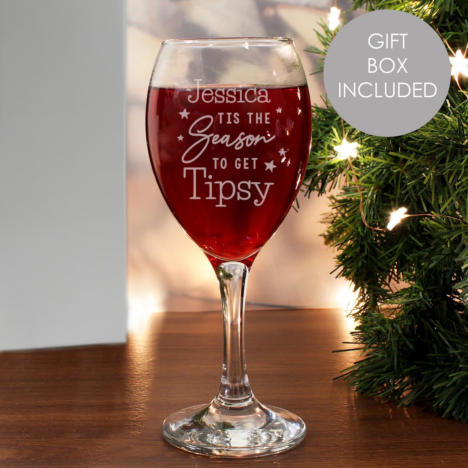 Personalised Christmas wine glass with name and tipsy season wording