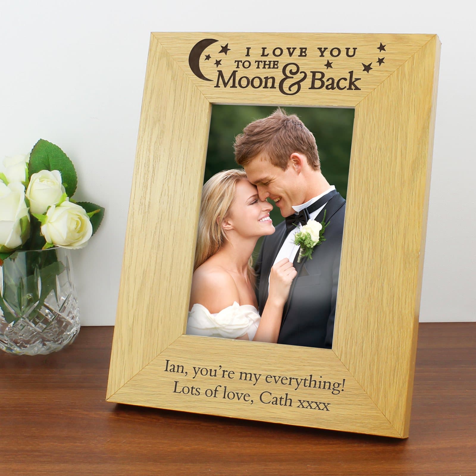 Oak veneer portrait photo frame with a personalised to the moon and back message
