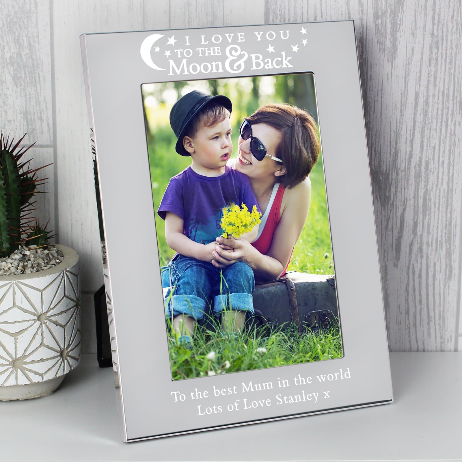 Silver aluminium photo frame personalised with I love you to the moon and back