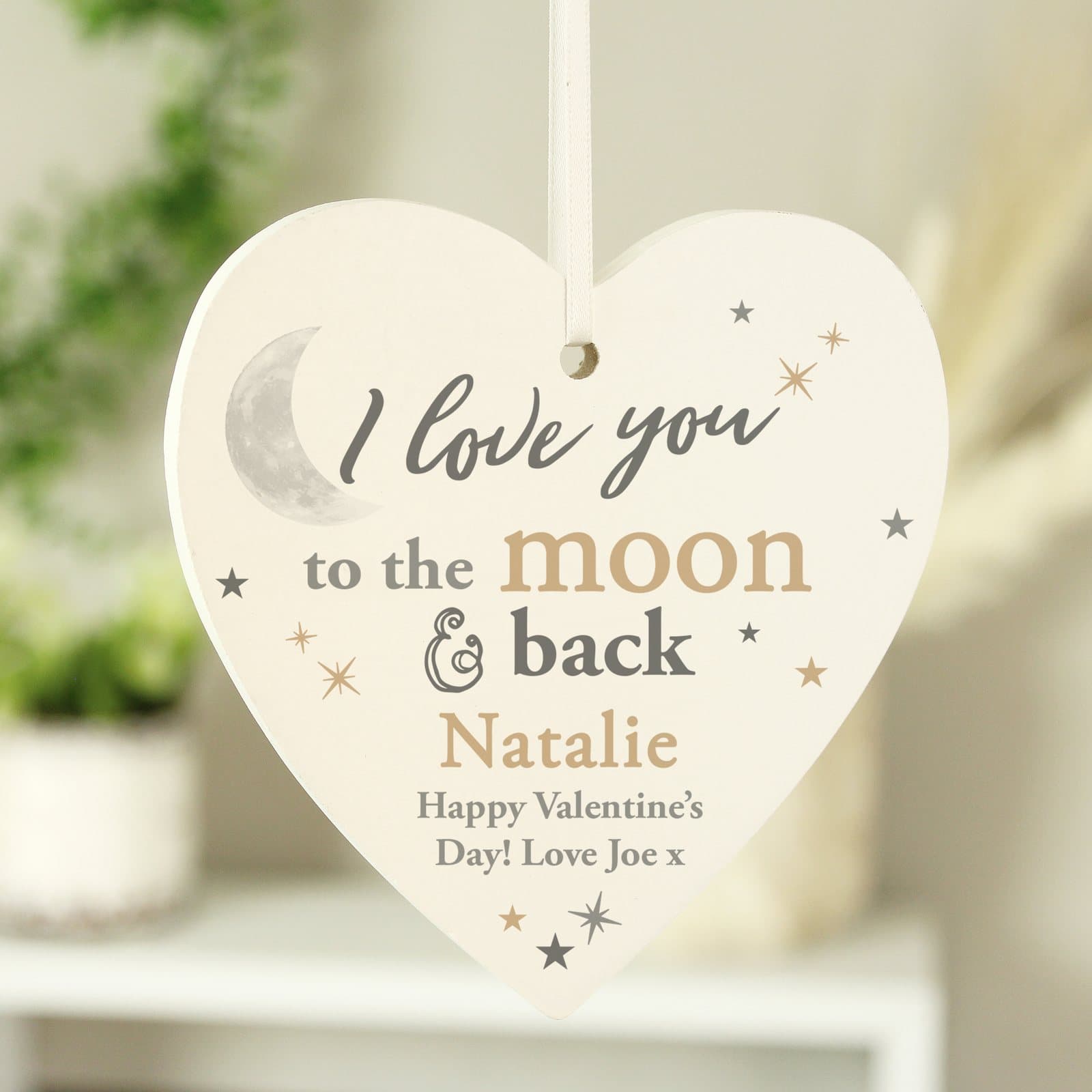 Wooden heart decoration with ribbon and a name and message