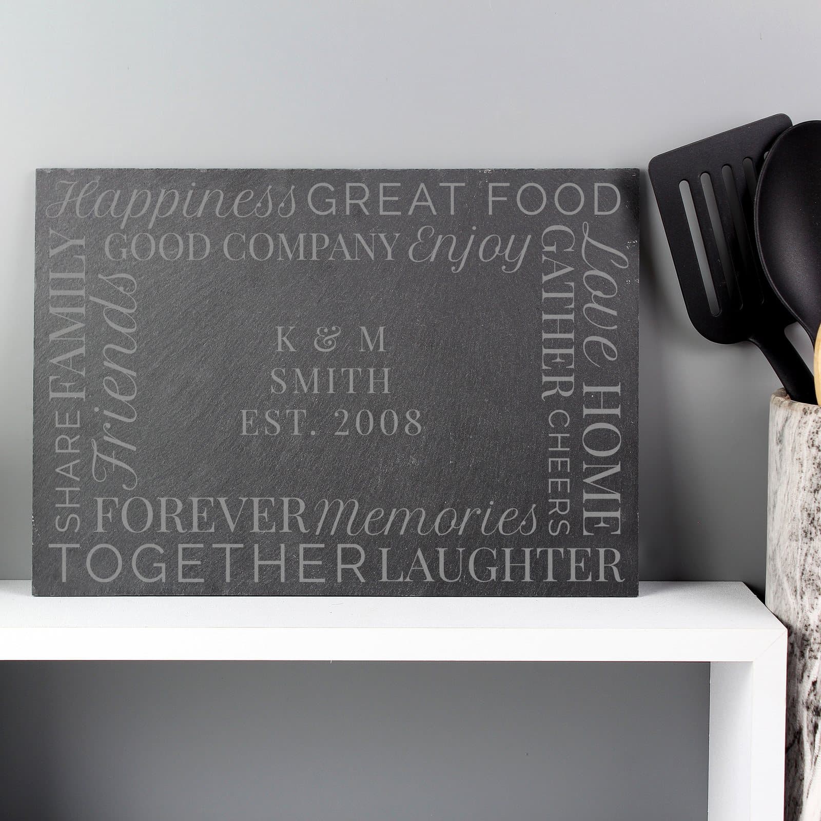 Hand cut slate placemat personalised for a couple