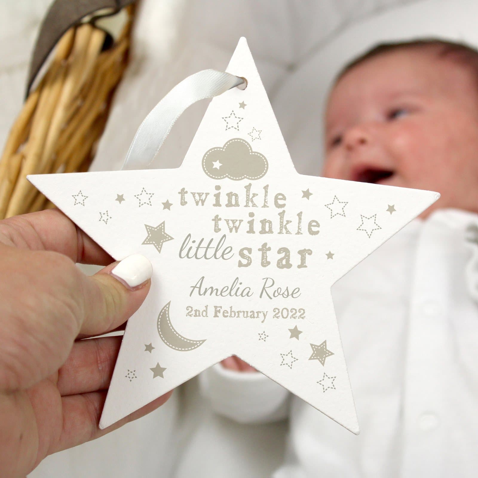 Wooden star decoration with ribbon and personalised name and date of birth