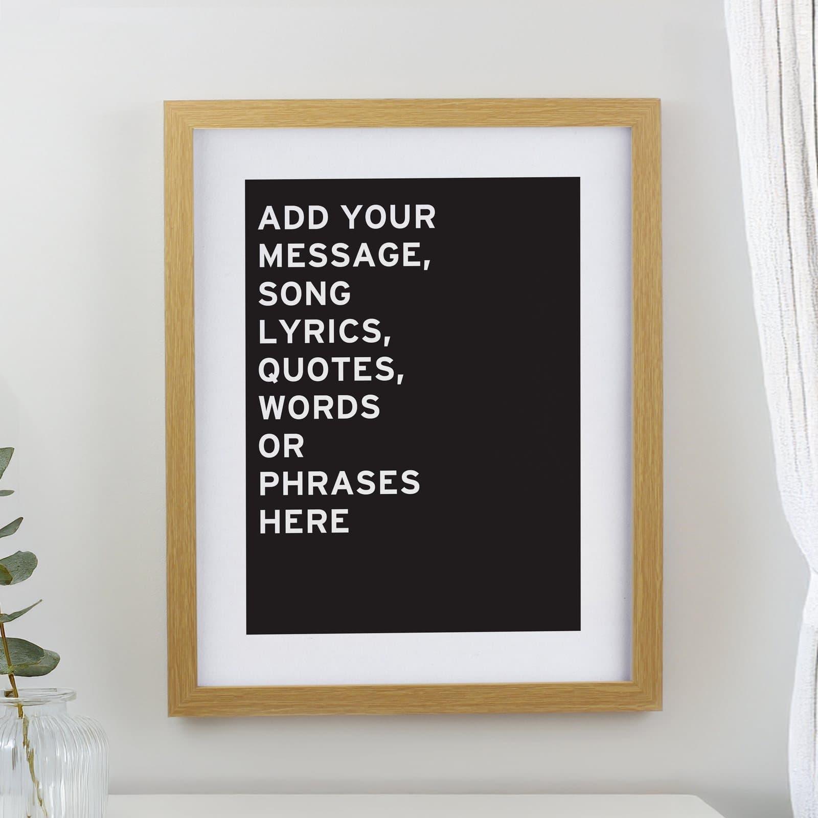 Oak framed typography print with personalised lines of capital letters