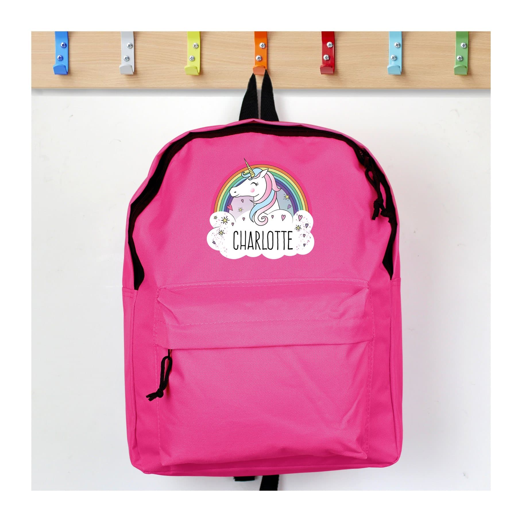 Pink unicorn backpack with front zip pocket and padded straps