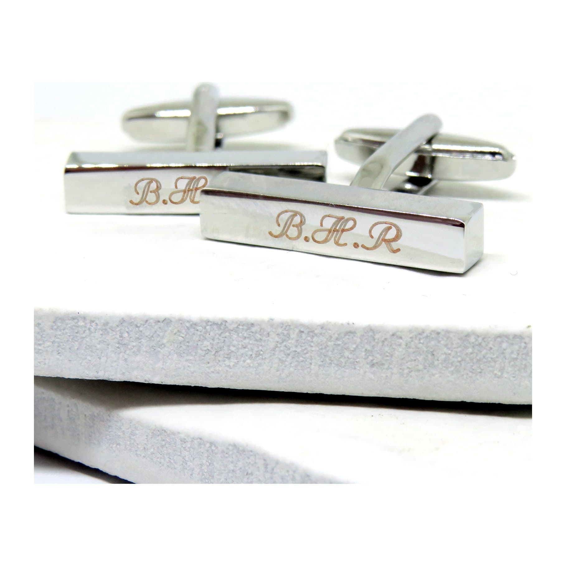 Silver coloured personalised bar cufflinks with a thin rectangular bar shape