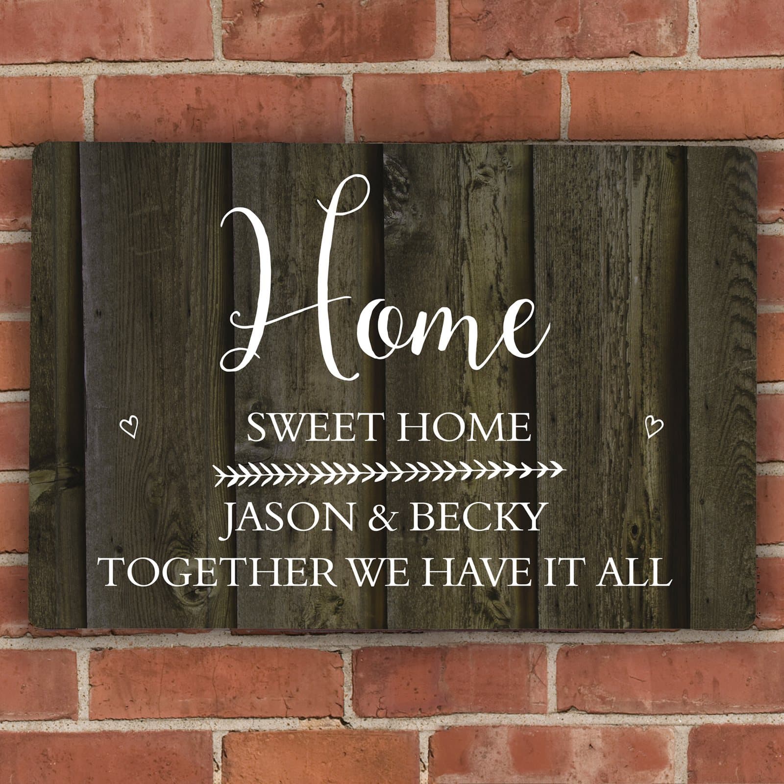 Aluminium sign with a walnut woodgrain effect and four lines of text