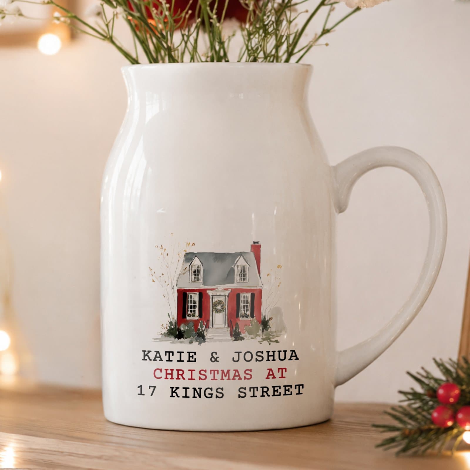Ceramic flower jug with a Christmas house design and personalised lines of text
