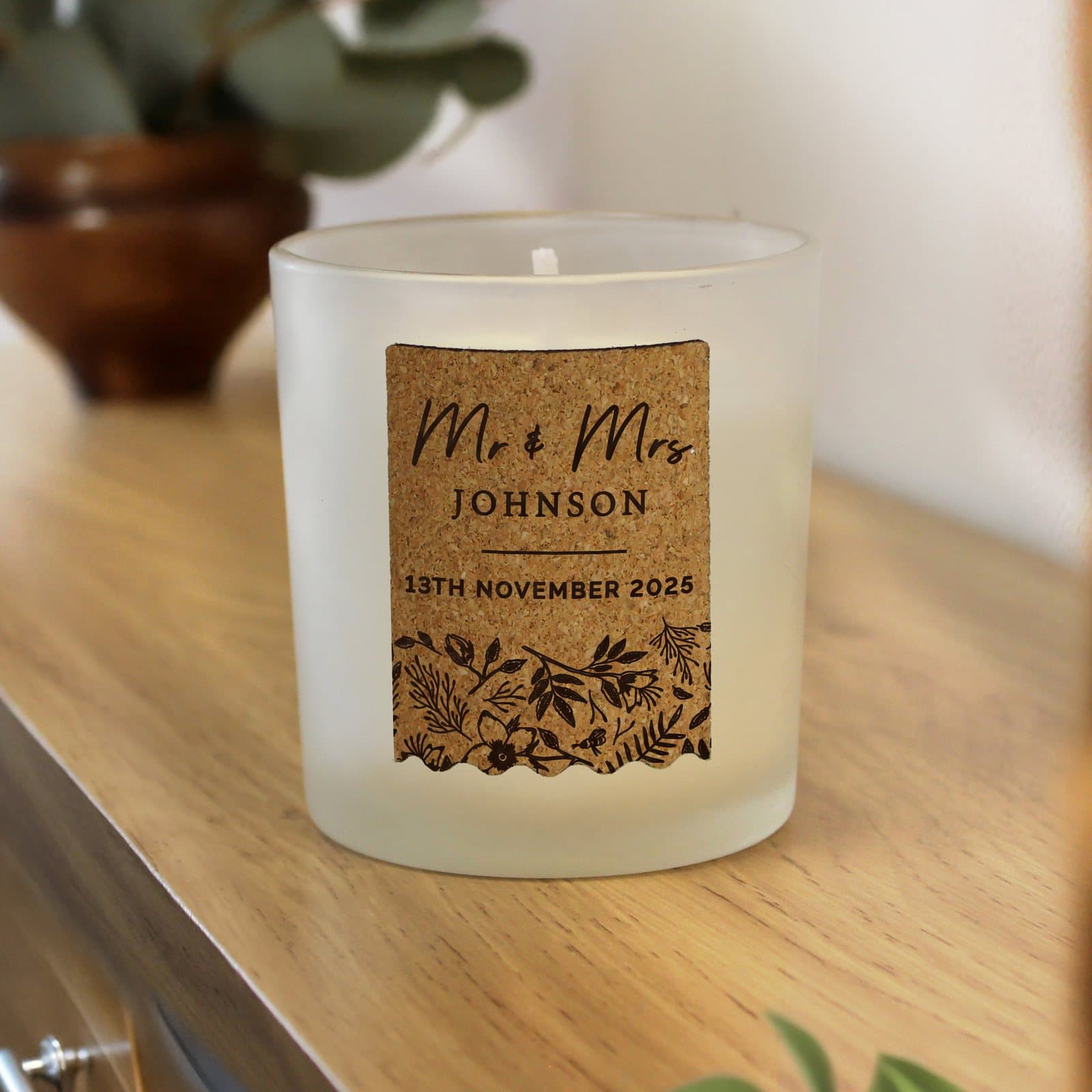 Vanilla wedding candle jar with a personalised cork label