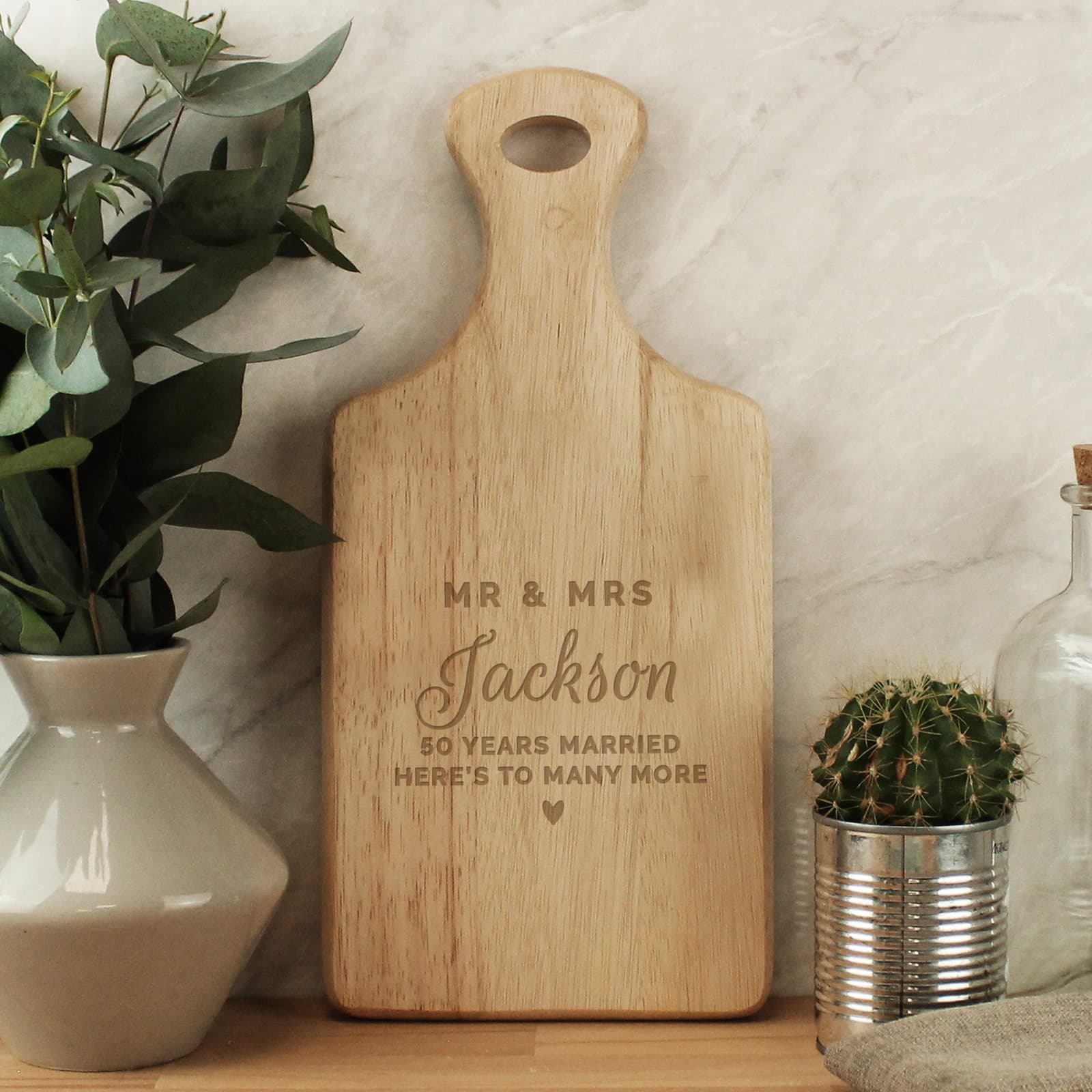 Wooden wedding paddle board with four lines of personalised text
