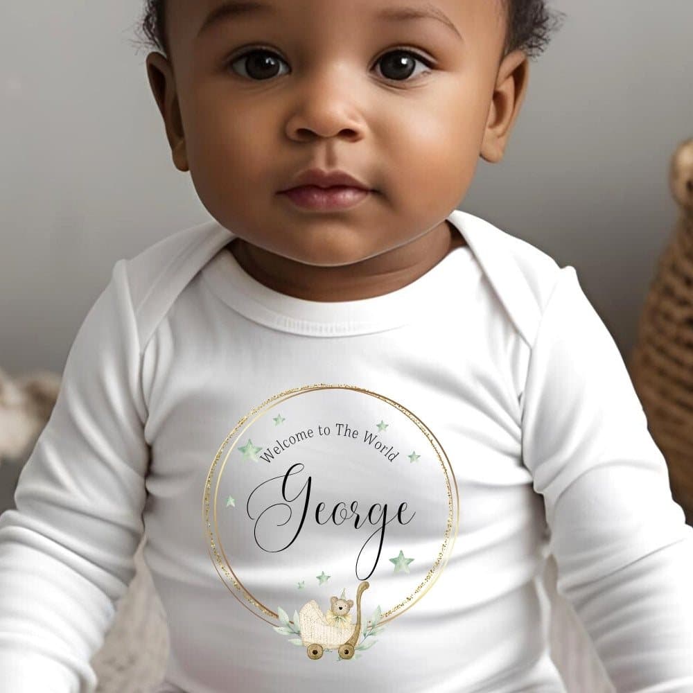 Personalised Welcome to the World baby outfit with the name in the design