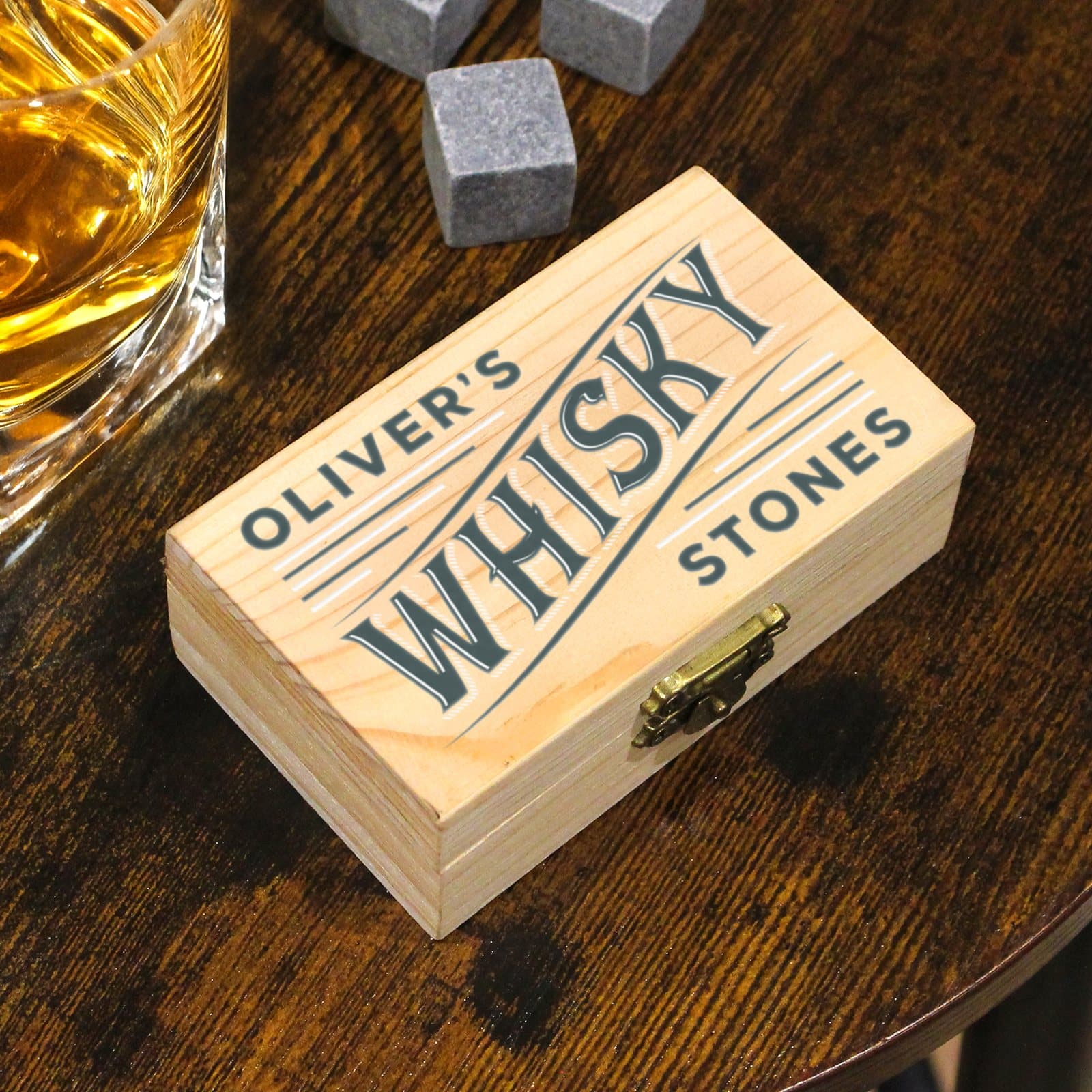 Whisky stones set in a wooden clasp locked box with WHISKY STONES text