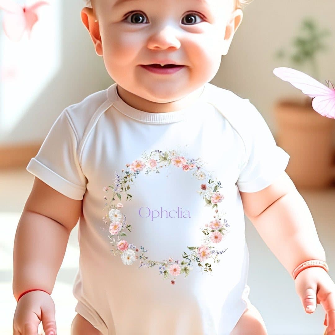 Personalised wild flower baby grow, vest or bib with a name