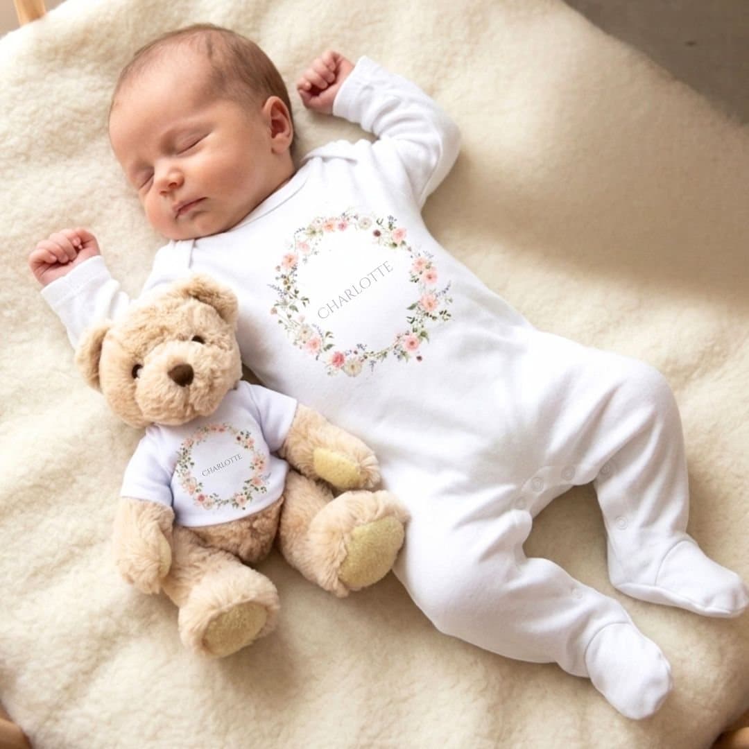 Personalised wild flower baby gift box with a teddy bear and a vest