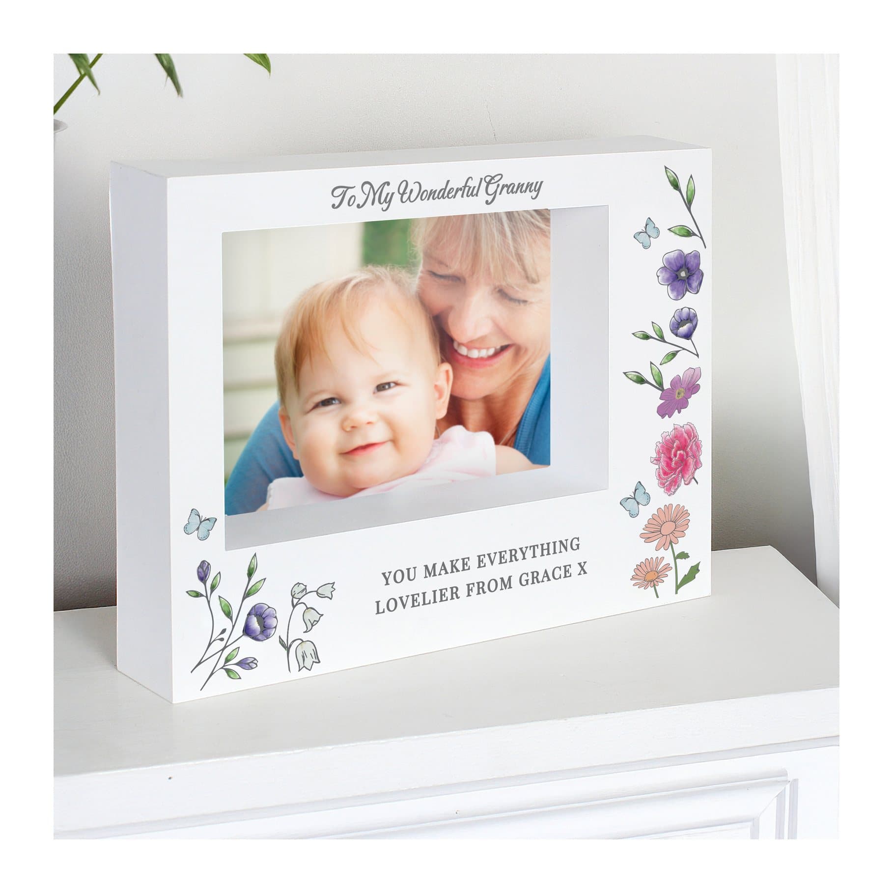 Plastic box photo frame with a wild flowers design and three lines of personalised text