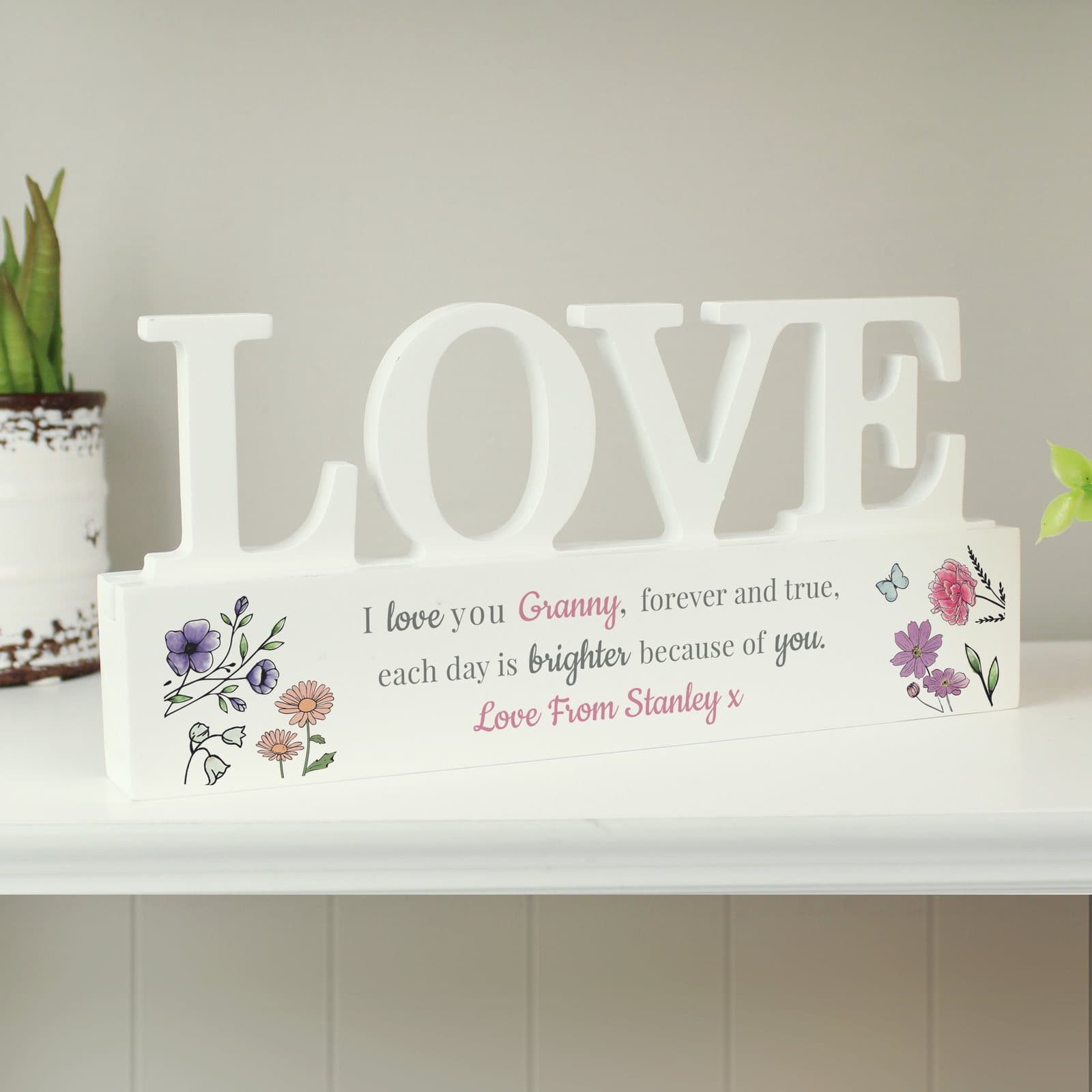 Wooden love ornament with wildflower illustrations and personalised name