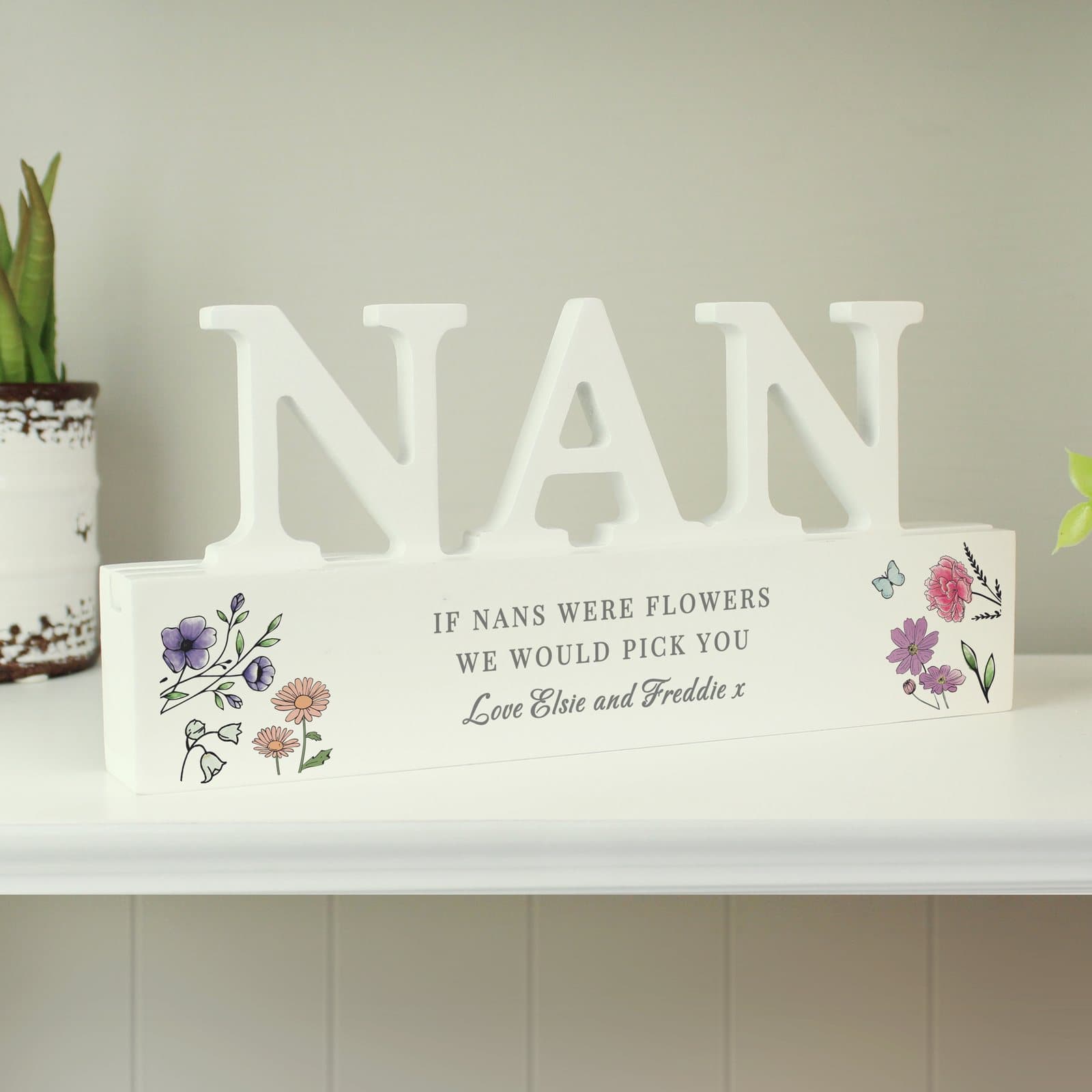 Wooden nan ornament with wildflower illustrations and three personalised lines