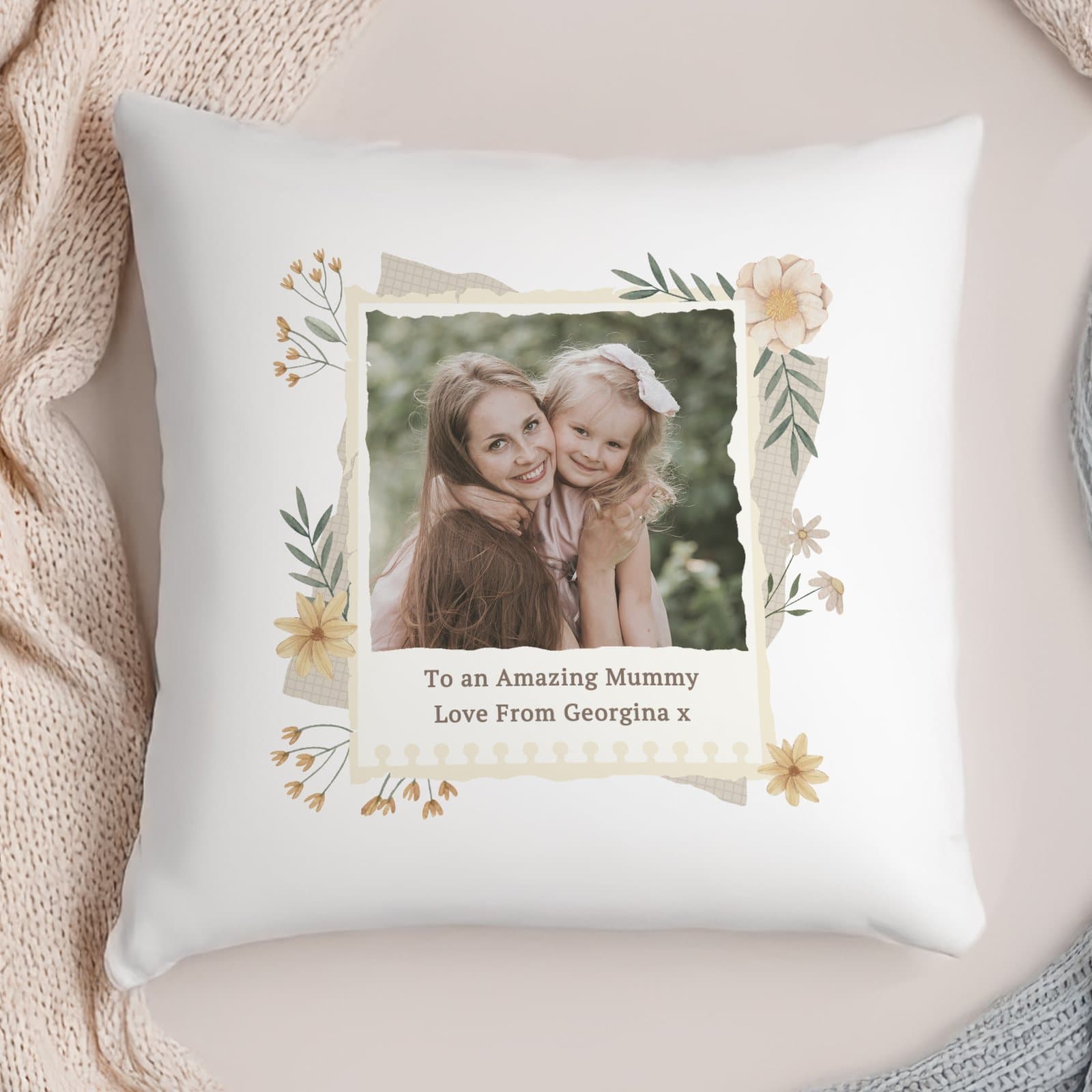 Cushion with a wildflowers design, a photo and two lines of text
