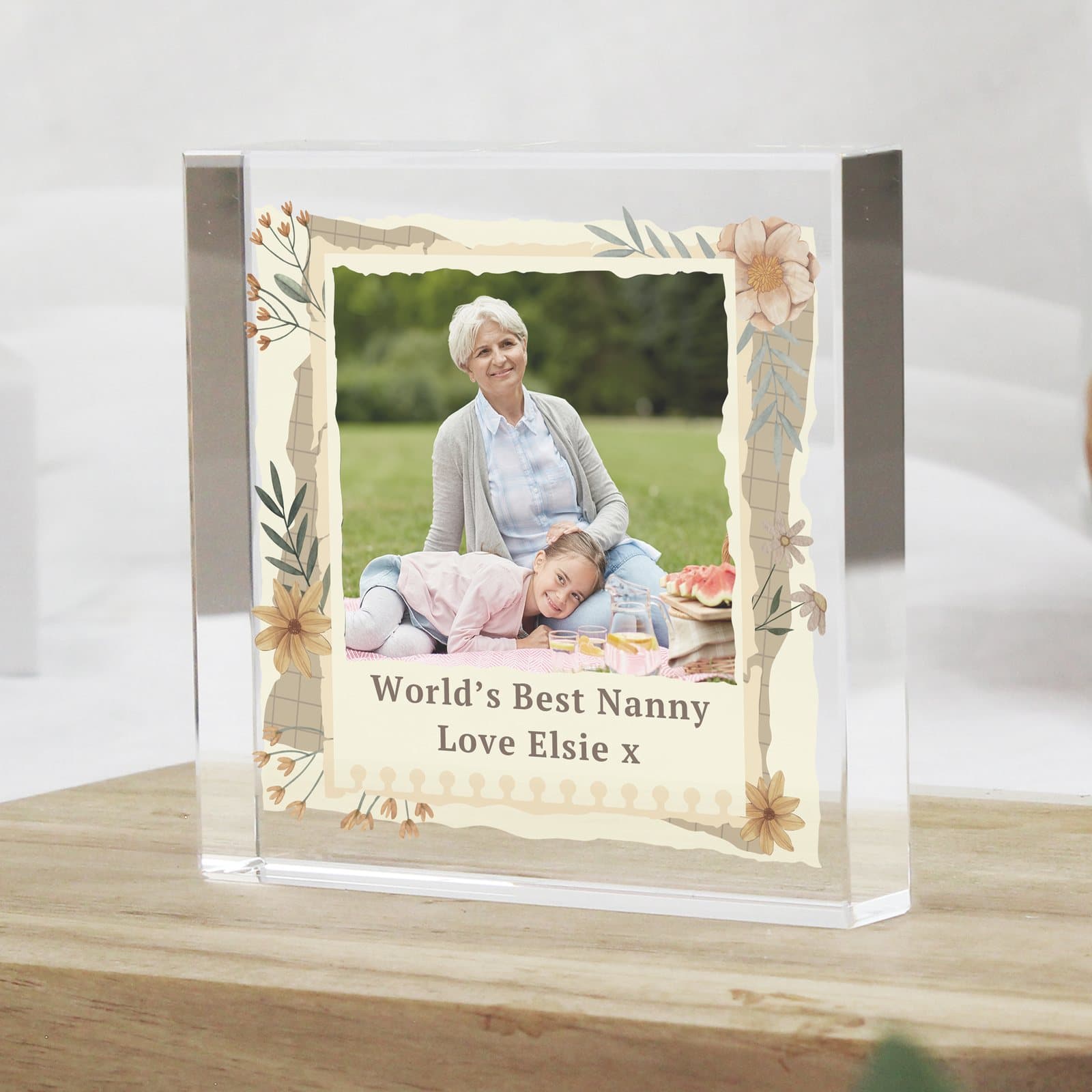 Small crystal token with a wildflower design, a photo and a two-line message