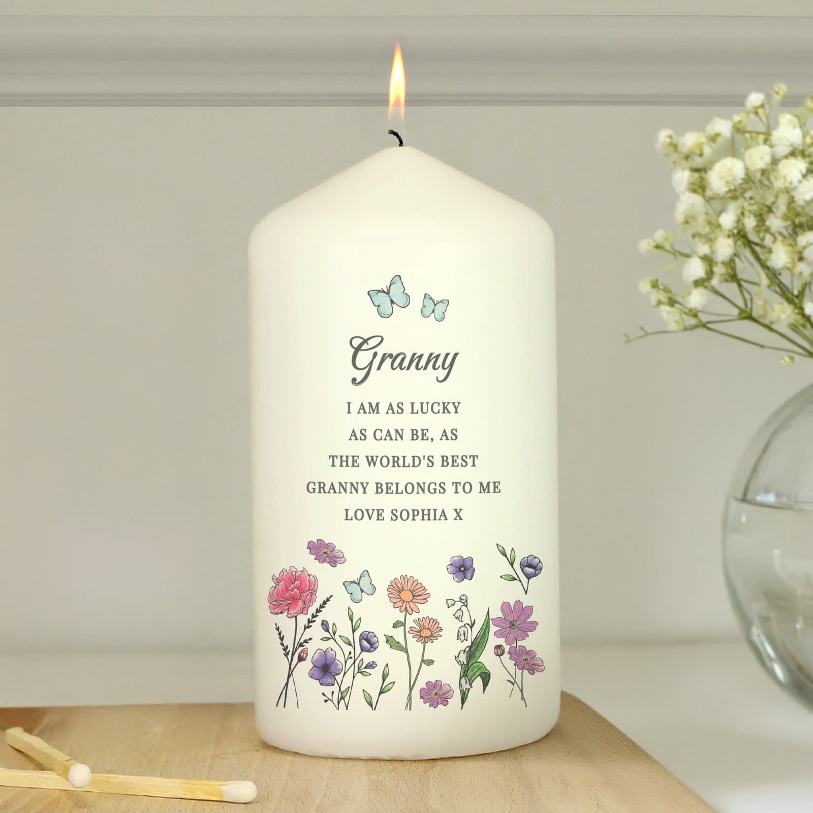 Personalised wild flowers pillar candle with wildflower designs