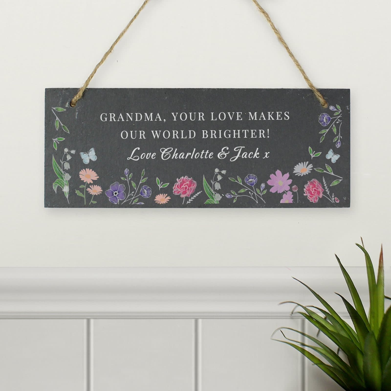 Slate garden sign with a wildflower illustration and personalised text