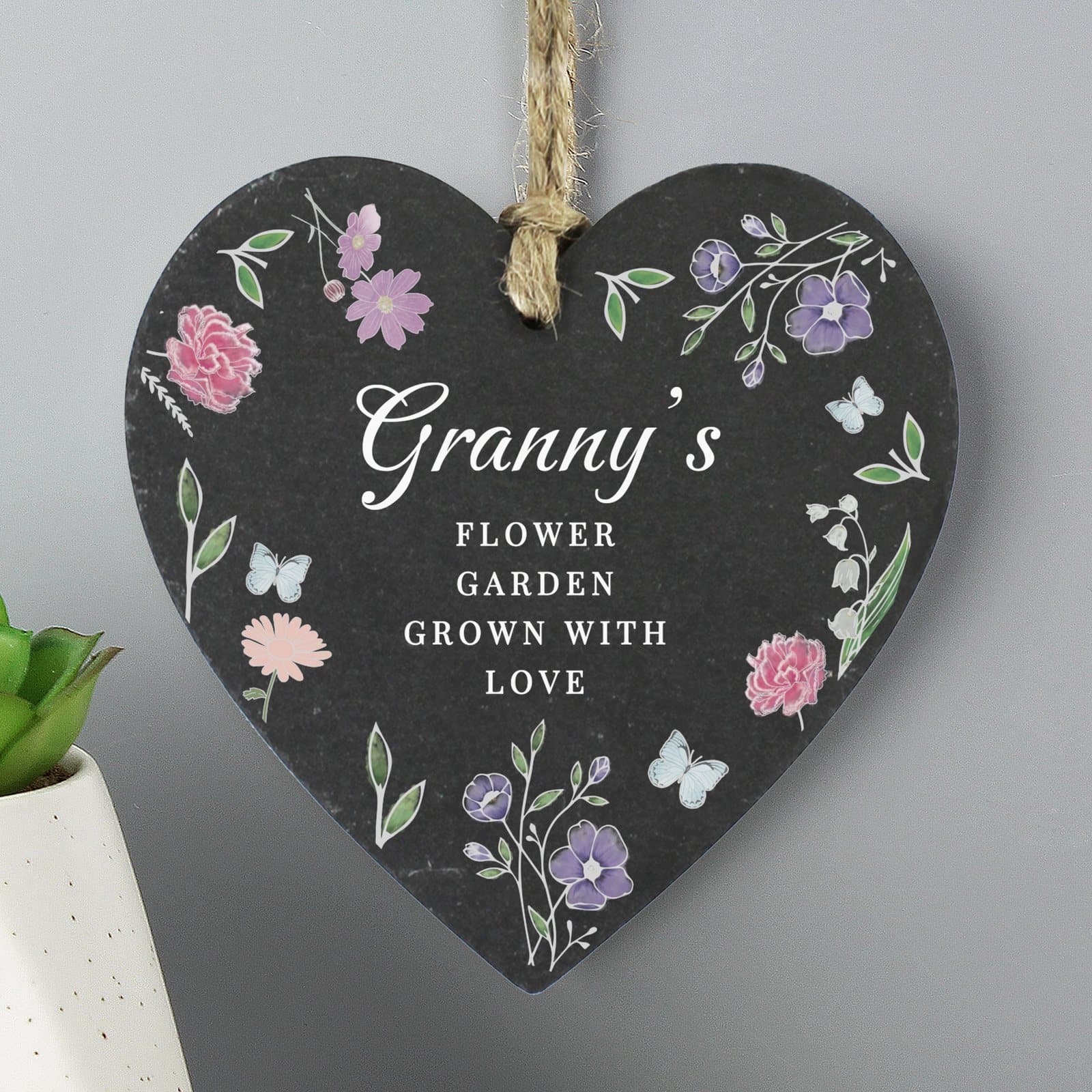 Slate heart decoration with a wildflower design and personalised text
