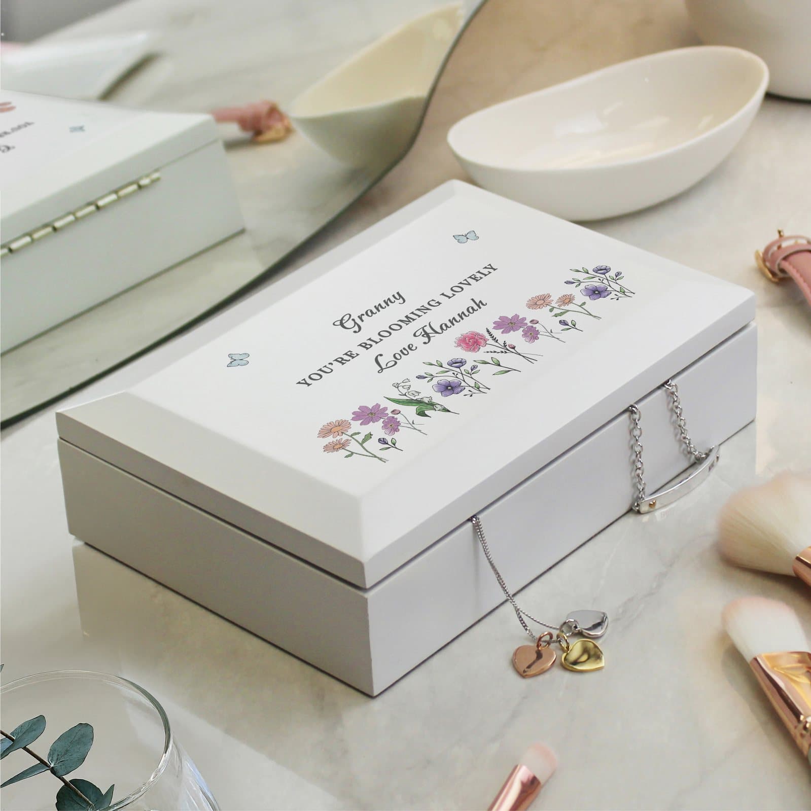 White wooden jewellery box with a wildflower design