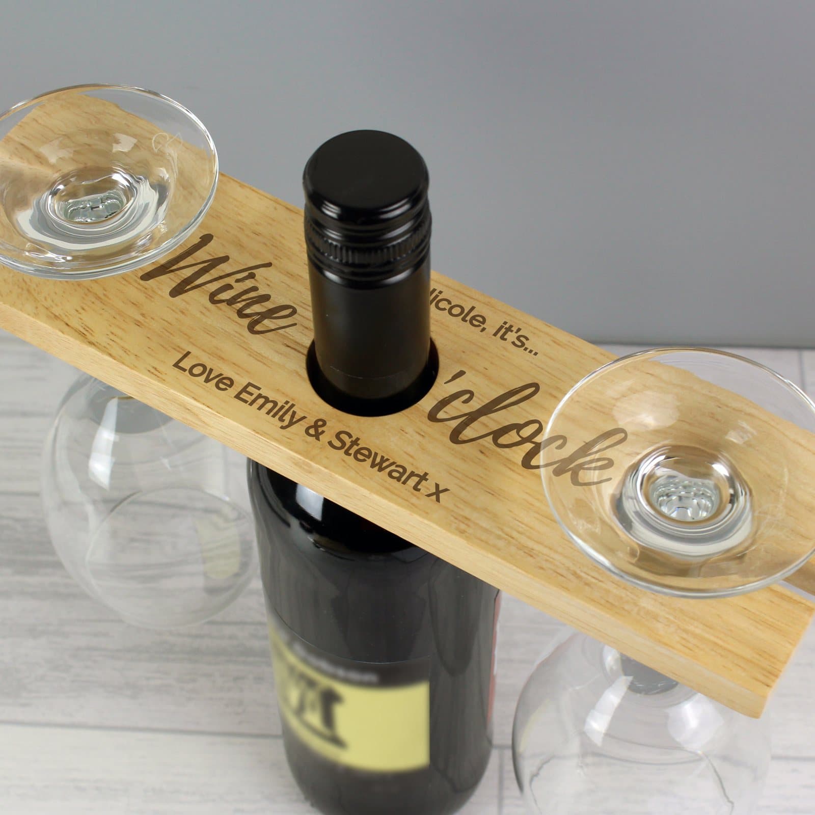 Wooden wine bottle and glass holder with Wine O'clock text