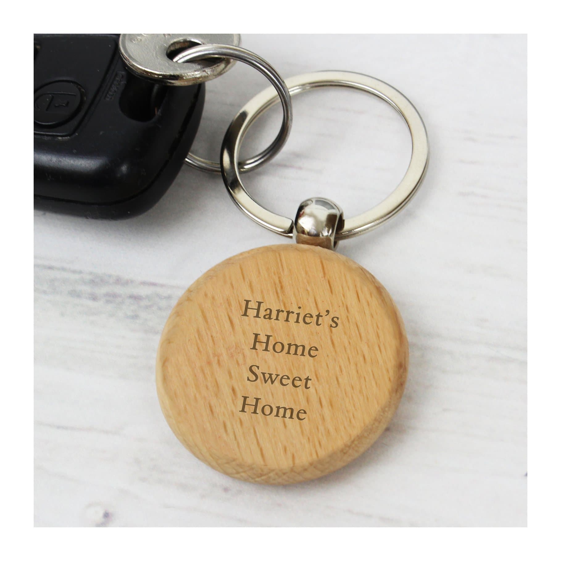 Wooden keyring personalised with four lines of text