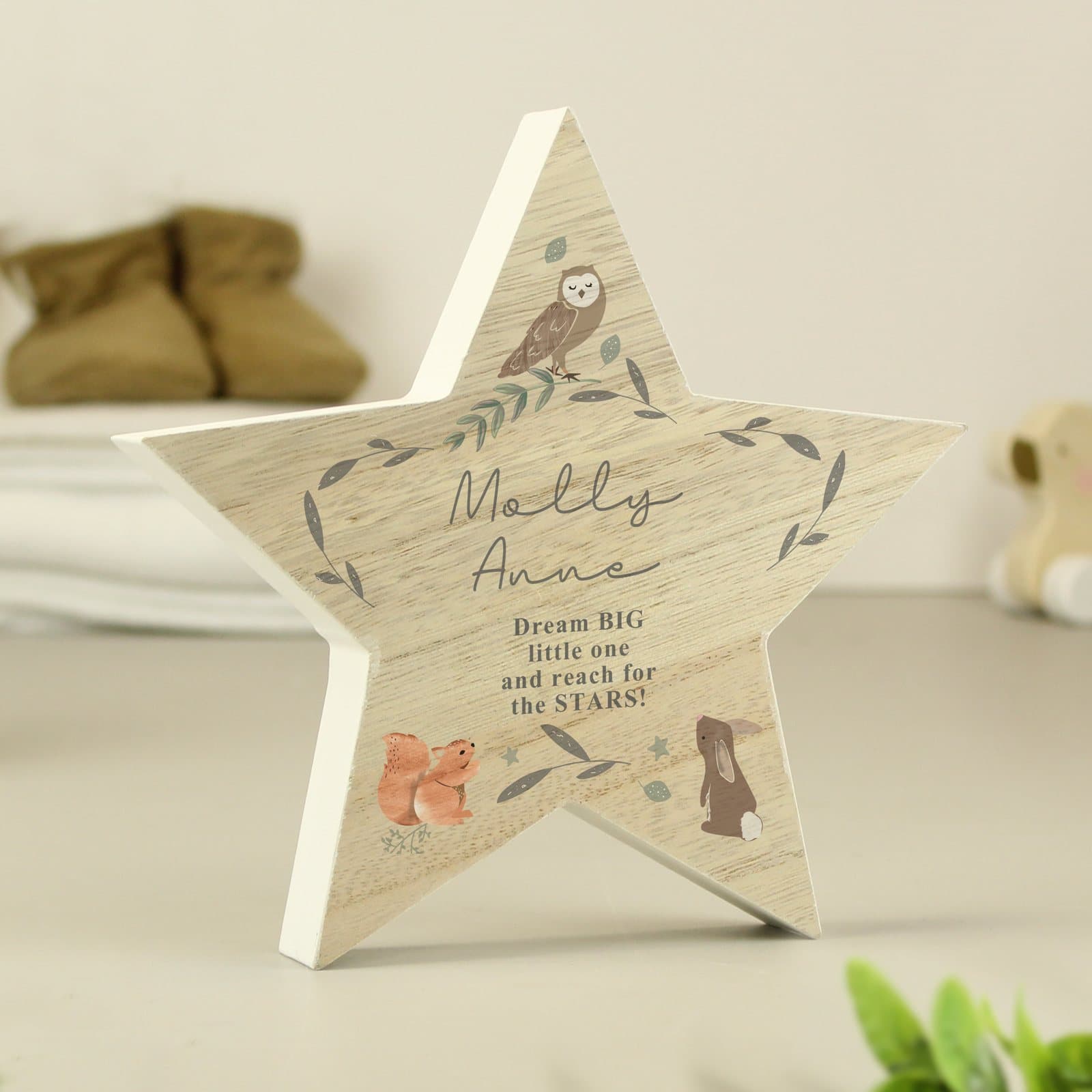 Wooden star decoration with woodland animals