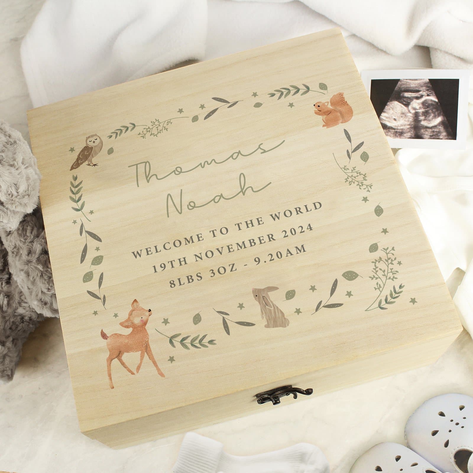 Wooden woodland animal keepsake box with a metal clasp