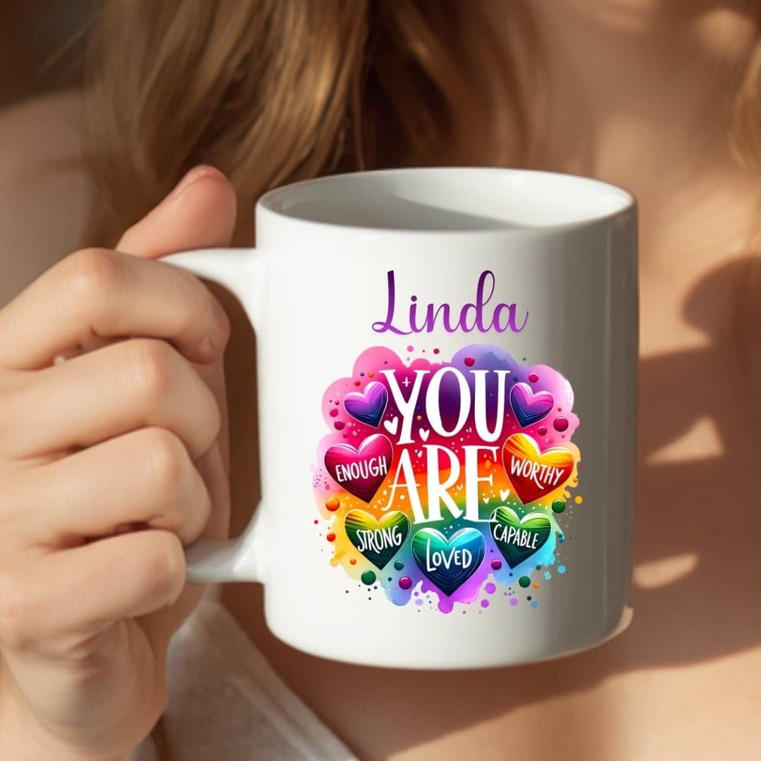 Ceramic mug with a You Are Enough affirmation design printed on it