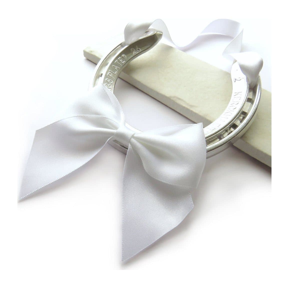 Silver horseshoe with a white satin ribbon, a real wedding horseshoe gift
