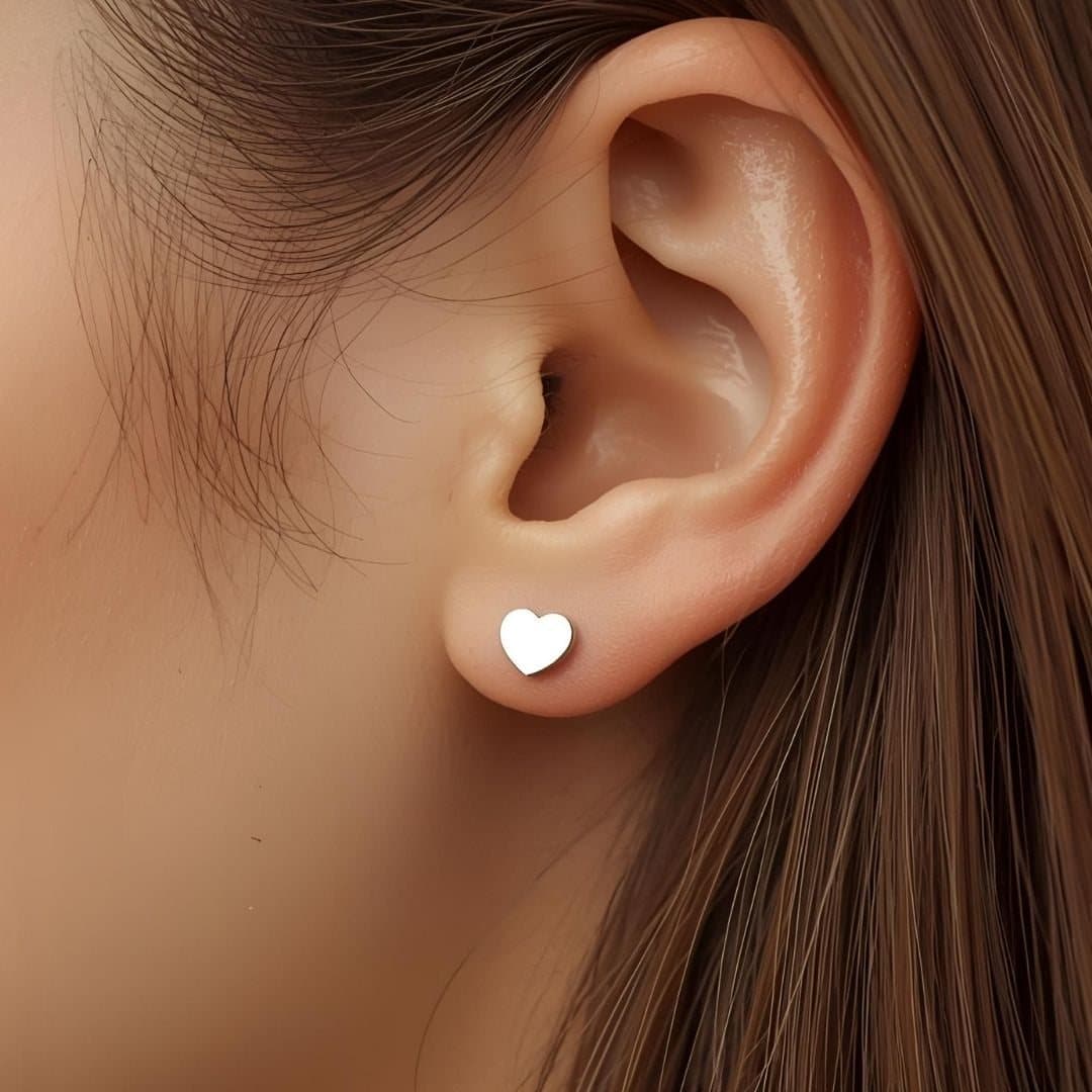 Silver heart stud earrings in bright silver stainless steel
