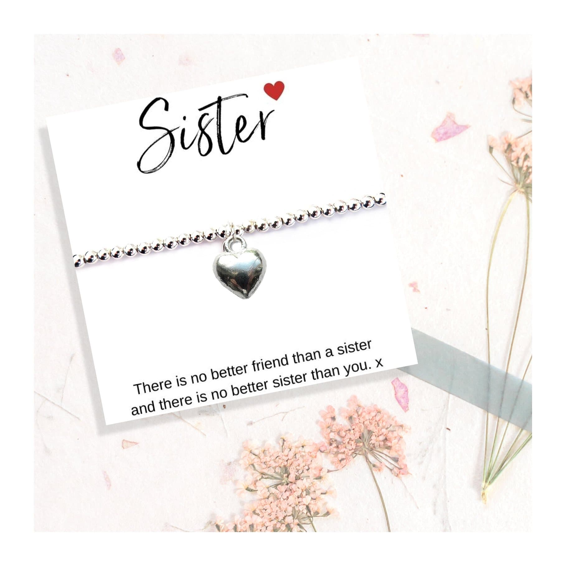 Silver heart charm stretch beaded bracelet with a sister quote gift card